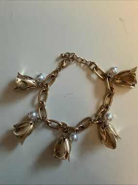Gold Tone Floral Charm Style Bracelet with Pearl Accents